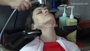 6207 VanjaA in boots backward salon shampooing hair and ear by barber