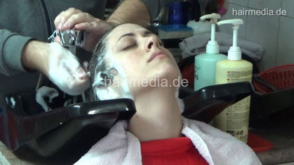 6207 VanjaA in boots backward salon shampooing hair and ear by barber