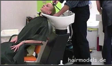 h074 Yvonne backward salon hairwash by barber