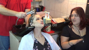 6207 young girls Mia 1 backward salon shampooing hair by barber