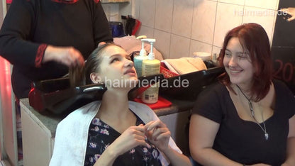 6207 young girls Mia 1 backward salon shampooing hair by barber