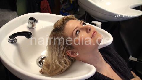 9048 01 Alina blonde business woman backward salon shampooing in skirt, nylons and highheels by SandraN