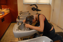Load image into Gallery viewer, 964 AlisaF barberette self shampooing a salon shampoostation