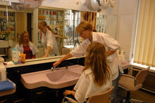 Load image into Gallery viewer, 630 ManuelaS Salon Buschmann forward shampoo in pink bowl