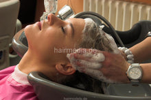 Cargar imagen en el visor de la galería, 694 SandraK in skirt sexy shampooing in pvc shampoocape by polish hairdresser