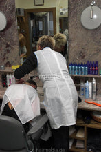 Load image into Gallery viewer, b011 Teen Jessi strong forward wash and blow by mom in white apron in vintage salon