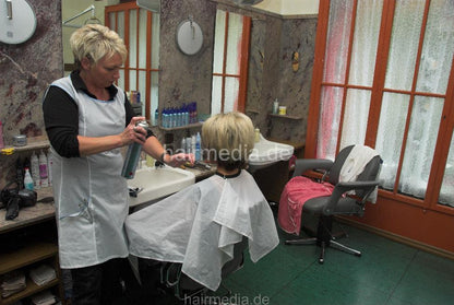 b011 Teen Jessi strong forward wash and blow by mom in white apron in vintage salon