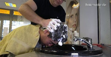 2009 Carlos 1 forward shampoo wash in pvc cape by barber Nico