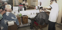 将图片加载到图库查看器，8071 Dina 2 cut and buzz by old barber in barbershop between the men