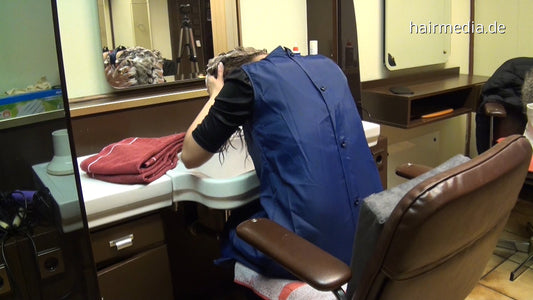 8131 1 Agata barberette in RSK nylon apron  forced to self forward hairwash in salon bowl