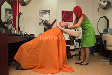 Cargar imagen en el visor de la galería, 294 NadjaZ 16 doing old male customer nv backward wash in oversized orange nyloncape