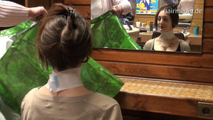 6158 Damaris 1 backward salon shampooing hairwash in heavy green plastic shampoocape