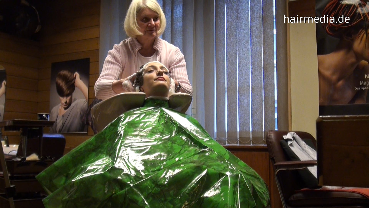 6158 Damaris 1 backward salon shampooing hairwash in heavy green plastic shampoocape