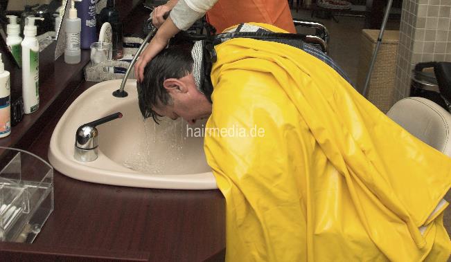 199 11 male client forward wash in heavy yellow vinyl shampoocape tie closure