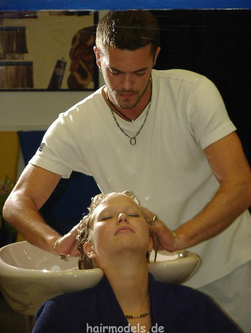 607 long blond hair by young barber shampooing and wet set