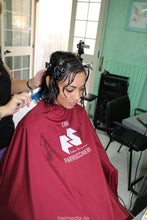 Load image into Gallery viewer, 8077 Constanza shampooing in blue gloves and haircut