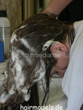 Load image into Gallery viewer, 6017 Carisa shampoo forward in vintage Karlsruhe salon white barbershop bowl