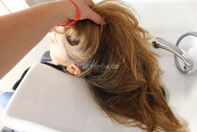 Cargar imagen en el visor de la galería, 1060 Natia braces model in broken jeans by Lorena backward shampoo hairwash