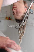 Load image into Gallery viewer, 9000 Sabine in Munich by Conny shampooing at home forward over bathtub