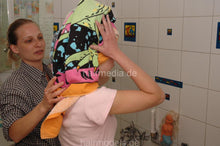 Laden Sie das Bild in den Galerie-Viewer, 9000 Sabine in Munich by Conny shampooing at home forward over bathtub