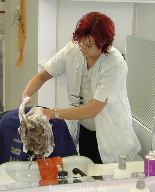 500 Martina salon shampooing forward by redhead barberette in white apron