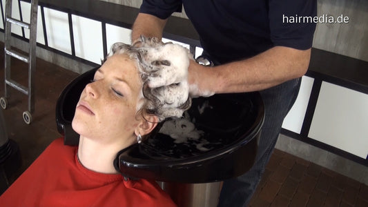 376 Redhead Barberette SarahP in redcape backward shampoo by barber