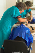 Cargar imagen en el visor de la galería, 520 Mature Barberette Gerty shampooing forward in Dederon RSK and pvc shampoocape
