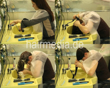 Laden Sie das Bild in den Galerie-Viewer, 959 Steffi barberette self shampooing in salon at forwardbowl in shiny cape