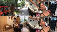 Load image into Gallery viewer, 370 Kt 1 by young barber Khaled shampooing in backward salon shampoobowl