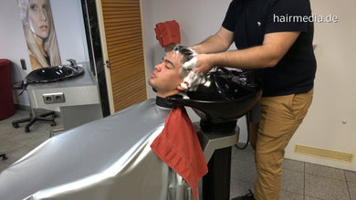 2009 Carlos 3 backward shampoo in pvc cape by barber Nico