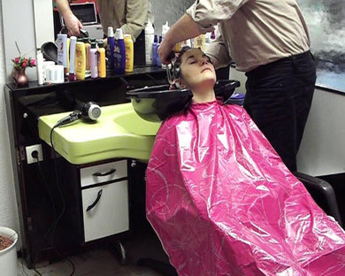 332 Kerstin backward in forward sink by barber in pink PVC shampoocape