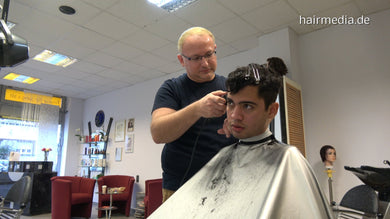2009 Carlos 2 haircut by barber Nico in pvc cape