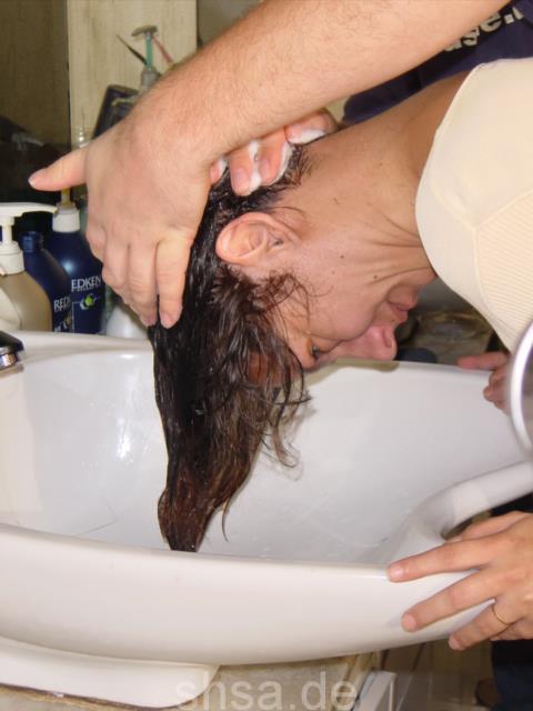 860 Paula forward shampooing by barber over backward bowl