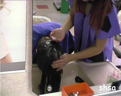 0058 s0002 forward shampoo hairwash 2 by student in apron