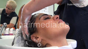 368 FatmaY by barber in tiger cape long black hair salon backward washing