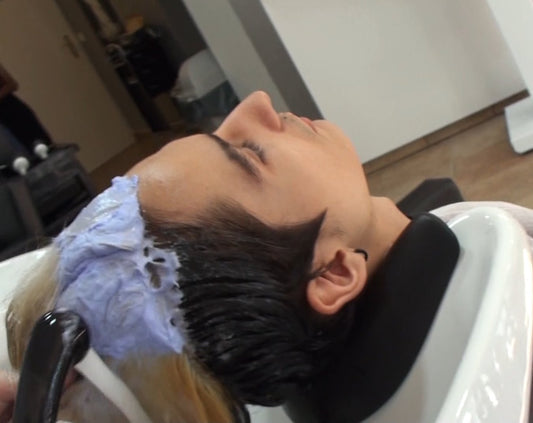 2008 s1811 2 shampooing a young man after bleaching