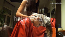 Load image into Gallery viewer, 361 SophiaA 2 strong forward hairwash by LauraL in heavy pvc shampoocape red vinyl