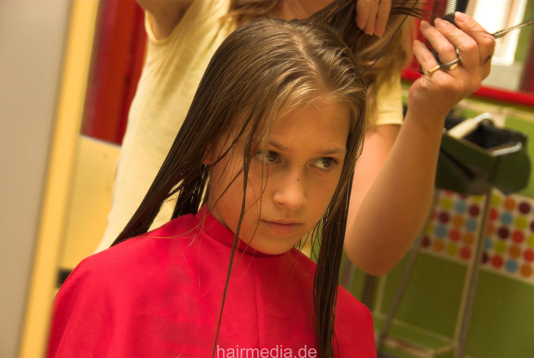 8083 Elena cut young girls hair cut in serbian salon in red cape