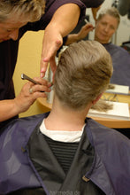 Cargar imagen en el visor de la galería, 8135 SabineK wash and cut long to short by buzzed female barber