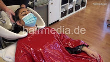Load image into Gallery viewer, 8162 Barberette Mirsada 1 backward wash by barber in her salon red heavy vinyl cape