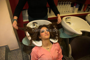 356 Barberette Aisha XXL curly hair backward richlather shampooing in her salon by colleauge