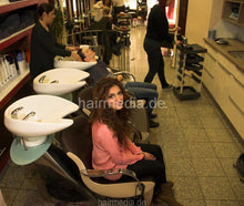 Laden Sie das Bild in den Galerie-Viewer, 356 Barberette Aisha XXL curly hair backward richlather shampooing in her salon by colleauge