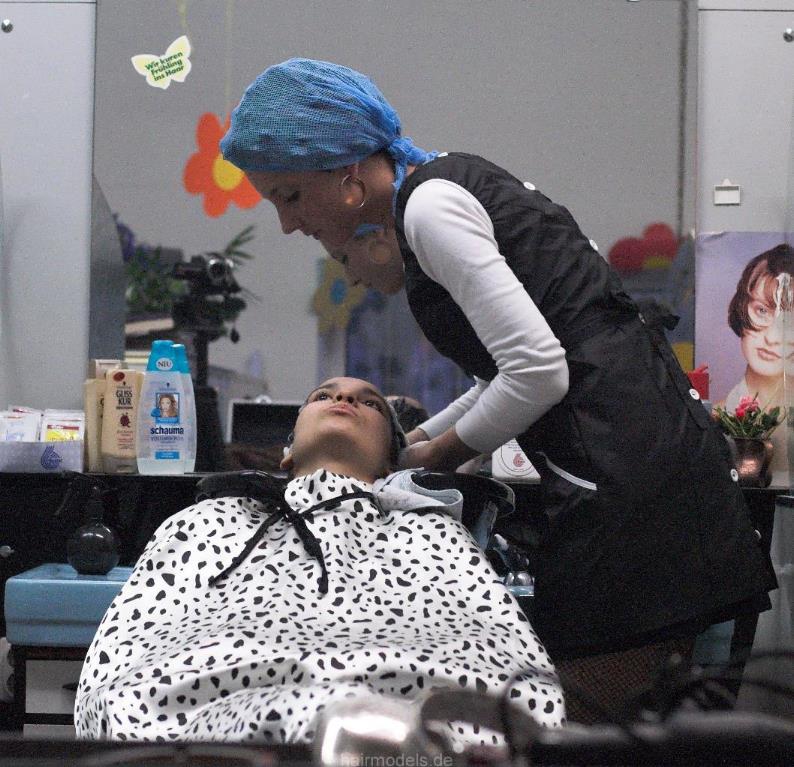 0003 CarmenK shampooing in tie closure shampoocape by barberette in rollers