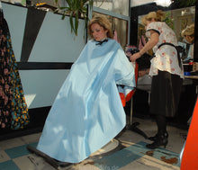 Laden Sie das Bild in den Galerie-Viewer, 121 Flowerpower 2, Part 2 LauraB haircut in barberchair in pink tie closure large haircutcape