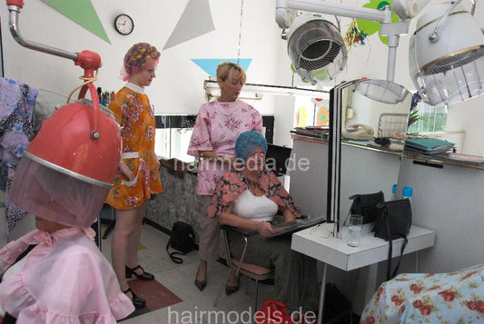 672 Part 6, backward shampooing and rollerset flowerpower apron and haircutcape