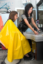 Load image into Gallery viewer, 898 1 Sandra, forced forward 4 hand shampoo in barbershop bowl in pvc vinyl shampoocape