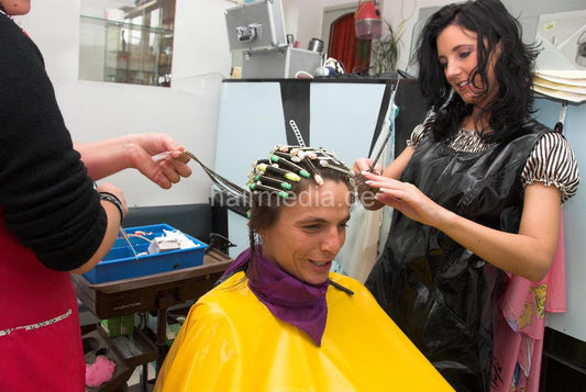 898 3 Sandra forced perm handcuffed in very heavy pvc cape TRAILER