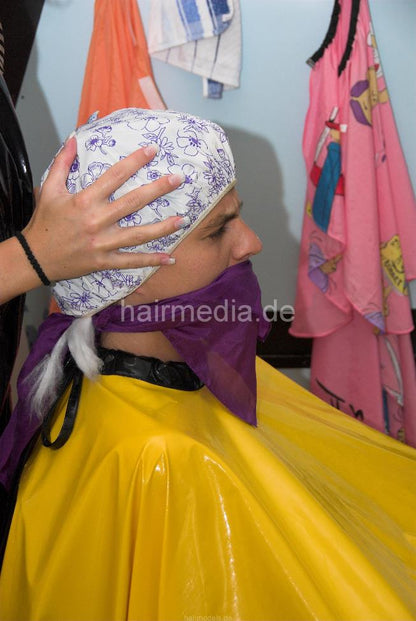 898 3 Sandra forced perm handcuffed in very heavy pvc cape TRAILER