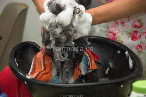 255 long hair guy Stan by AnjaS in flowerpower apron backward hairwash in mobile sink at forward bowl