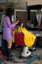 Load image into Gallery viewer, 240 male forward wash and buzzed much too short by NancyS in RSK apron and heavy yellow vinyl cape
